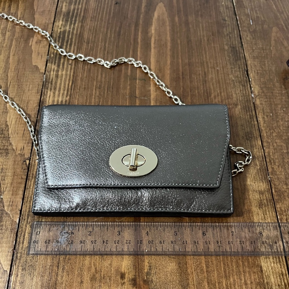 Coach metallic leather crossbody bag with light gold hardware